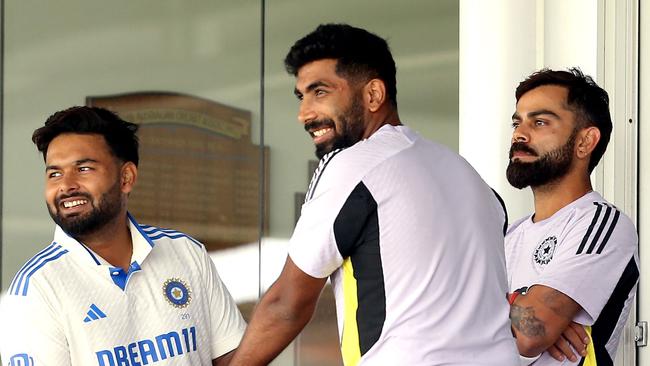 Indian players Virat Kohli (R), Rishabah Pant (L) and Jasprit Bumrah look on during the internal practice match between India and India A cricket teams at the WACA in Perth on November 15, 2024. (Photo by David Woodley / AFP) / -- IMAGE RESTRICTED TO EDITORIAL USE - STRICTLY NO COMMERCIAL USE --