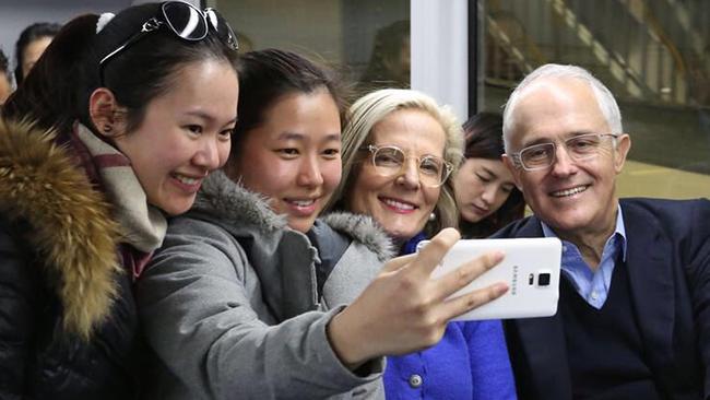 A photo appearing on the official Twitter page of Prime Minister Malcolm Turnbull aboard a train with wife Lucy.