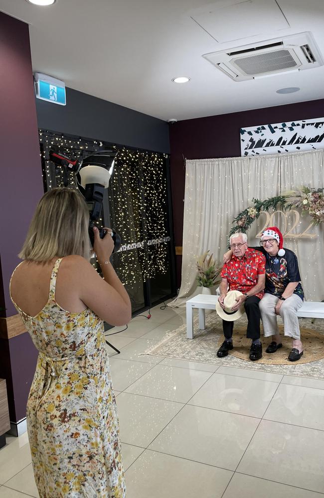 Pat and Chris Murray getting snapped by Stevie from North Australia Media on Christmas Day at Rydges Palmerston, 2022. Picture: Annabel Bowles