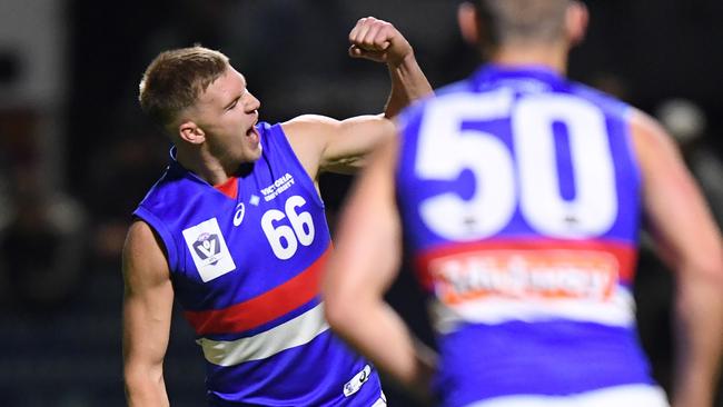 Robbie McComb celebrates a goal for the Bulldogs against Frankston. Pic: Morgan Hancock/AFL Photos