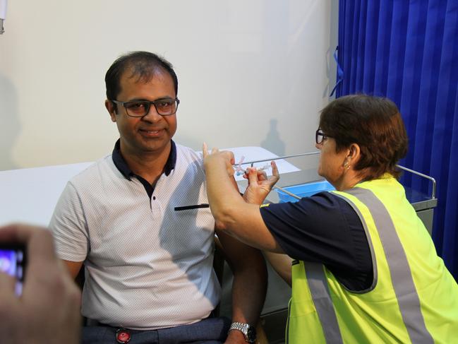 Gladstone and Banana Shire Director of Medical Services Dr Dilip Kumar receives the first AstraZeneca COVID vaccination in Gladstone on March 17, 2021. Picture: Rodney Stevens