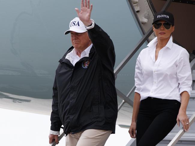 President Donald Trump, accompanied by First Lady Melania Trump, who was mocked for her footwear. Picture: AP Photo/Evan Vucci