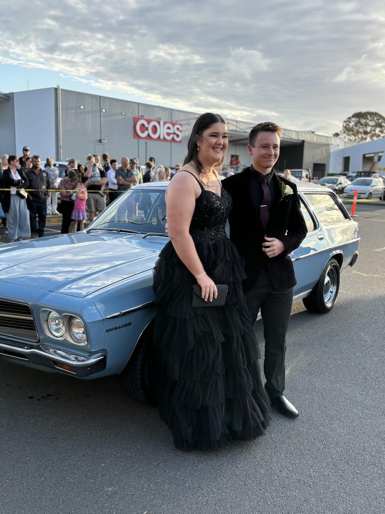 Oliver Kempster and Georgia Perkins arrive at the formal.