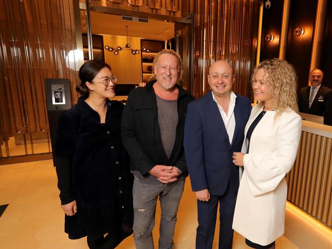 David Bromley, with wife Yuge, Larry Kestelman and his wife Anita,is the artist-in-residence at Kestelman's new $800m building in Chapel St.