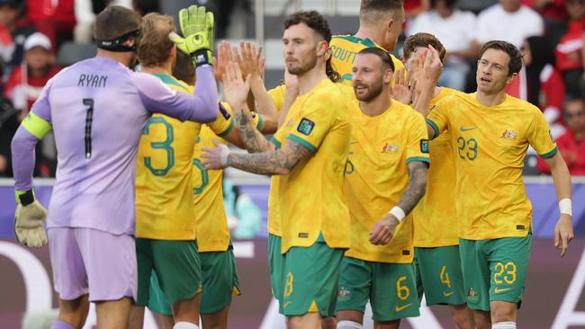 The Socceroos celebrate one of four goals against Indonesia. Picture: Lintao Zhang/Getty Images