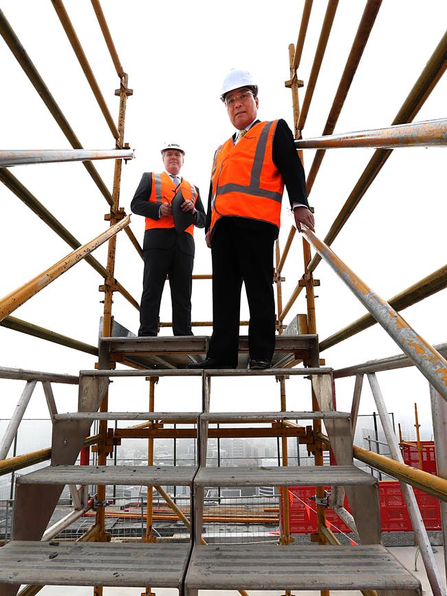 Japanese billionaire Katsumi Tada and Watpac boss Martin Monroe on top of the 34-storey development 180 Brisbane, which could be the new home for Q Super. Picture: Annette Dew