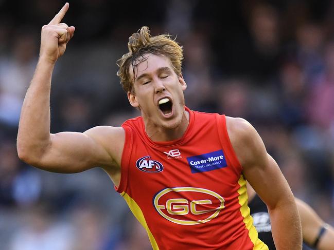 Tom Lynch of the Suns reacts after kicking a goal during the Round 2 AFL match between the Carlton Blues and the Gold Coast Suns at Etihad Stadium in Melbourne, Saturday, March 31, 2018. (AAP Image/Julian Smith) NO ARCHIVING, EDITORIAL USE ONLY