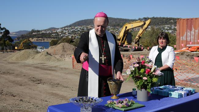 Tasmanian Archbishop Julian Porteous blesses the Maryknoll affordable housing development at Blackmans Bay