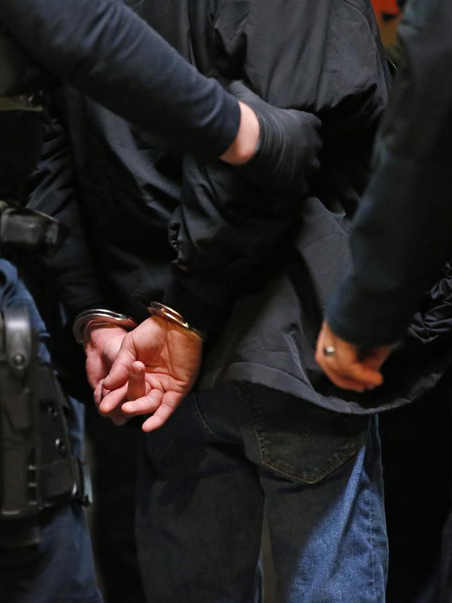 A fan in cuffs. Picture: David Caird