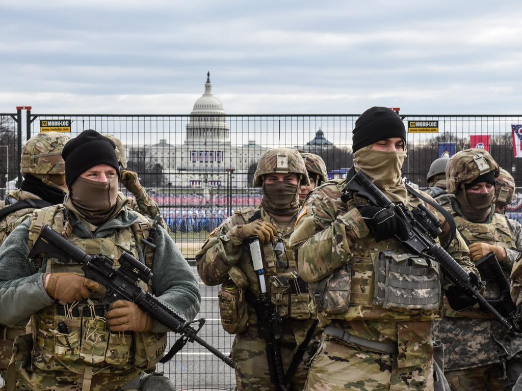 Members of the National Guard patrol the National Mall in Washington, DC ahead of Joe Biden’s inauguration. Picture: Getty Images/AFP