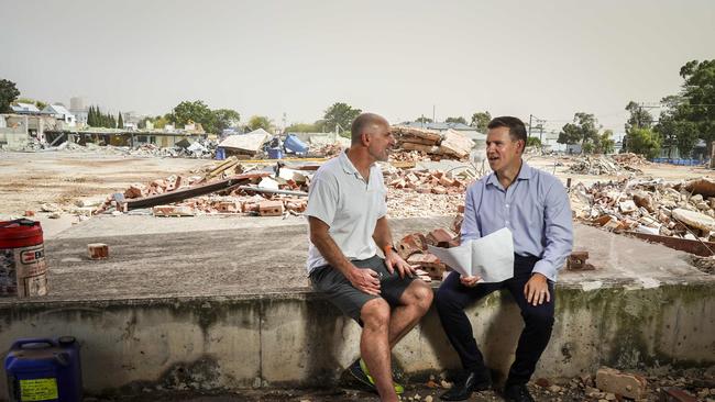 Local resident Rob Nachum (L) on the demolished Caroma site with Project Manager Daniel De Conno. Picture: Mike Burton/AAP