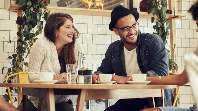 generic coffee picture. Young people having a great time in cafe. Friends smiling and sitting in a coffee shop, drinking coffee and enjoying together. Photo: iStock.