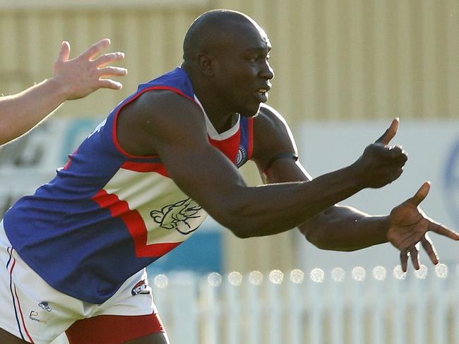 NFL footy: Northcote Park v North Heidelberg: Anthony Daw of North Heidelberg handpasses on Saturday, April 17, 2021 in Northcote, Australia