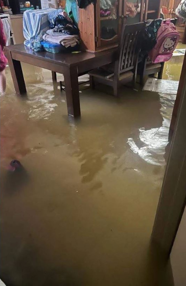 A mother's home in Currajong had raw sewage in the floodwater the went through her home on Wednesday.