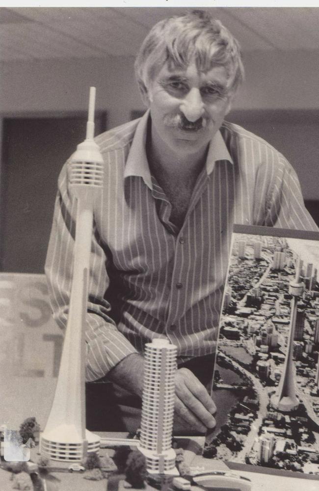 Pat Zarro with a model of the Zarro's Arrow development.