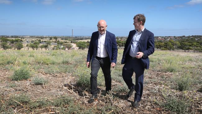 Urban Development of Australia (SA) chief executive officer Pat Gerace discusses plans for the residential land release at Hackham with Minister for Housing and Urban development Nick Champion in February. Picture Dean Martin