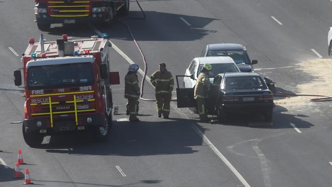 The crash claimed the life of a woman who was in the blue Mazda. Picture: Tony Gough.