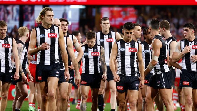 SYDNEY, AUSTRALIA - AUGUST 09: The Magpies look dejected after a loss during the 2024 AFL Round 22 match between the Sydney Swans and the Collingwood Magpies at The Sydney Cricket Ground on August 09, 2024 in Sydney, Australia. (Photo by Michael Willson/AFL Photos via Getty Images)