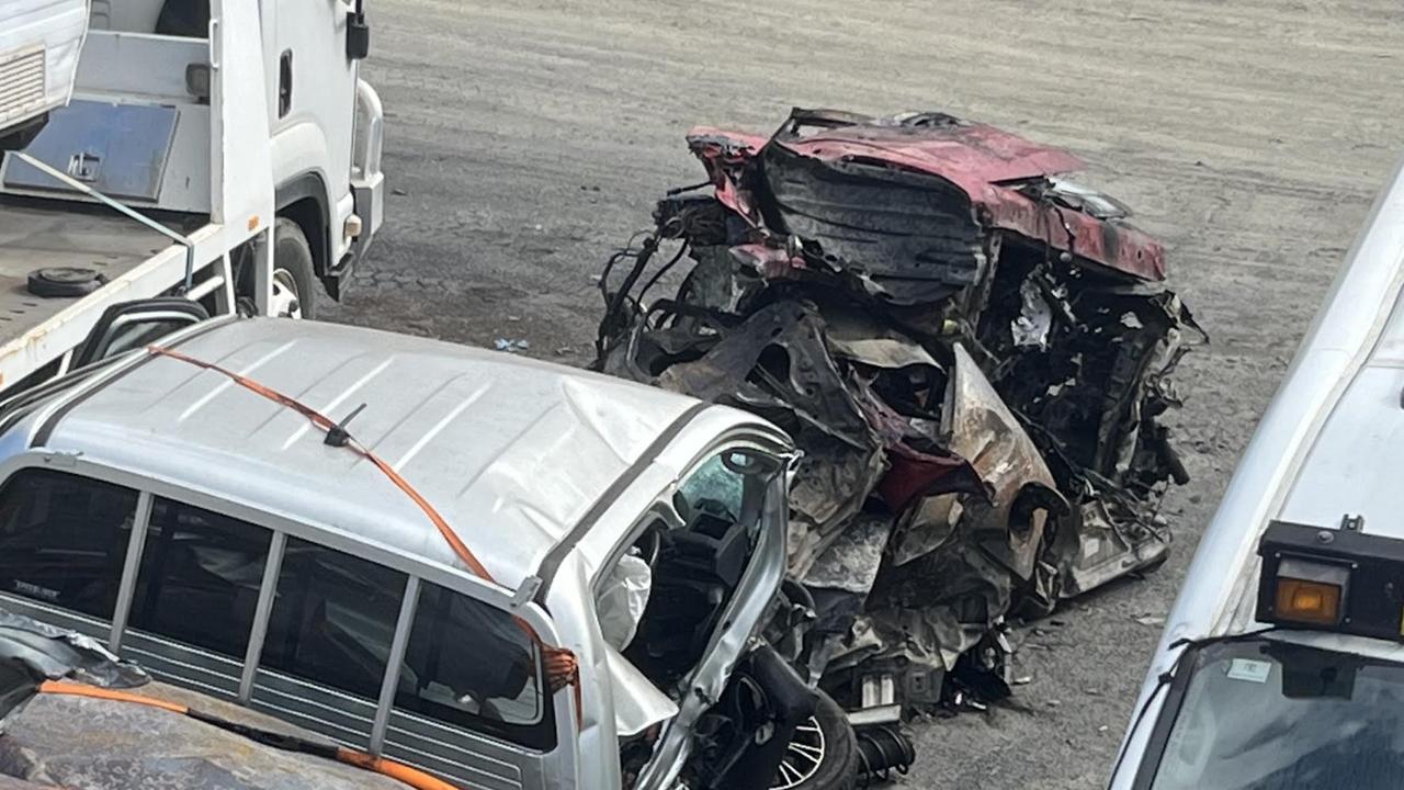 The remains of a Mazda 3 travelling east near Duaringa, about 107km from Rockhampton, when it collided with a Toyota HiLux travelling in the opposite direction.