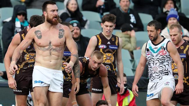 Port Adelaide’s Charlie Dixon loses his jumper during a melee. Picture: Sarah Reed