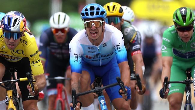 Caleb Ewan’s new teammate Dylan Groenewegen (centre) celebrates after winning the third stage of the 2022 Tour de France. Picture: Thomas Samson / AFP