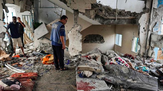 United Nations staff inside the school following the Israeli airstrike. Picture: AFP.