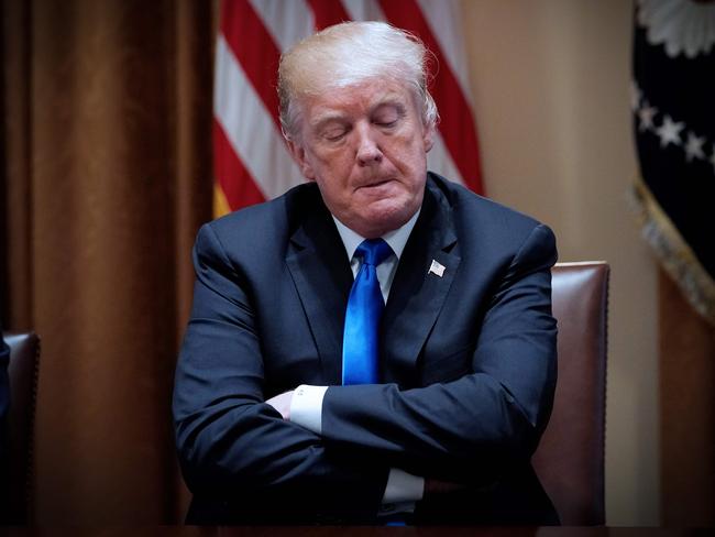 US President Donald Trump takes part in a meeting with bipartisan members of Congress on school and community safety in the Cabinet Room of the White House on February 28, 2018 in Washington, DC. / AFP PHOTO / MANDEL NGAN