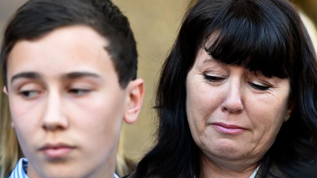 Thomas Kelly's brother Stuart (left) and mother Kathy (right) leave court today. Picture: AAP Image/Dean Lewins