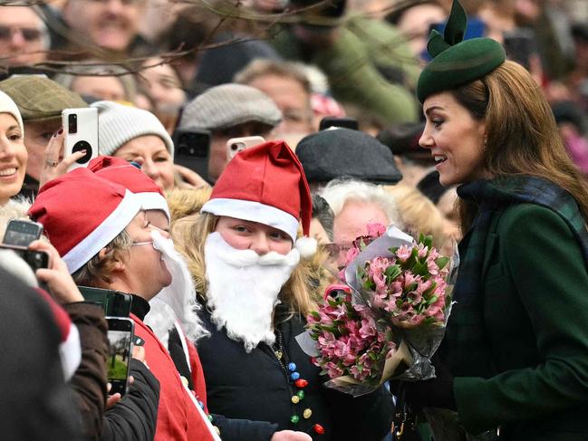 Princess Catherine chats to royal fans outside the church. Picture: AFP