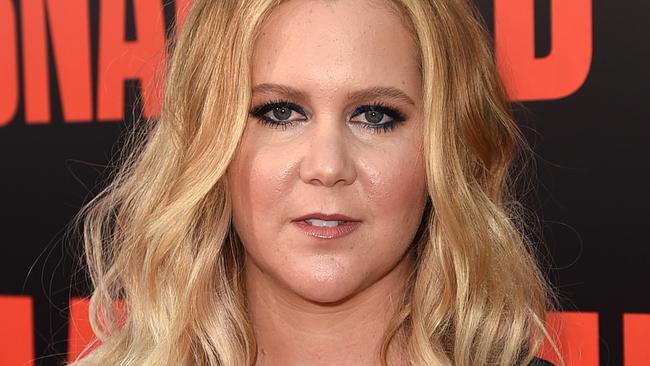 LOS ANGELES, CA - MAY 10:  Actress Amy Schumer arrives at the premiere of 20th Century Fox's "Snatched" at the Village Theatre on May 10, 2017 in Los Angeles, California.  (Photo by Kevin Winter/Getty Images)