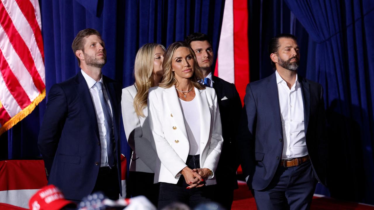 (L-R) Eric Trump, Tiffany Trump, Lara Trump, Michael Boulos and Donald Trump Jr on stage during Donald Trump’s victory speech. Picture: AFP