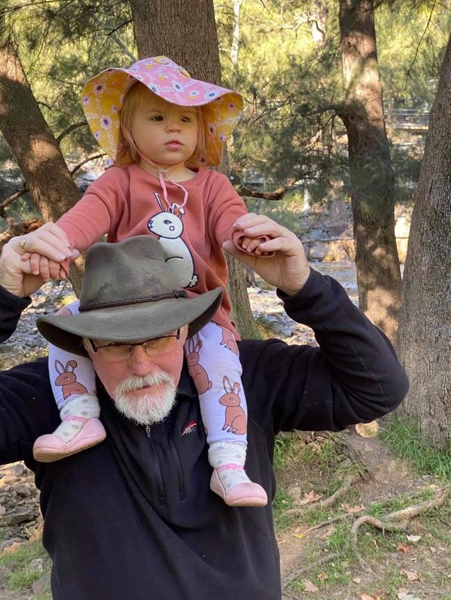 Nigel Harris with his granddaughter Evelyn. Family said the 60-year-old grandfather wanted to see Finke “his entire life”. Picture: Facebook.