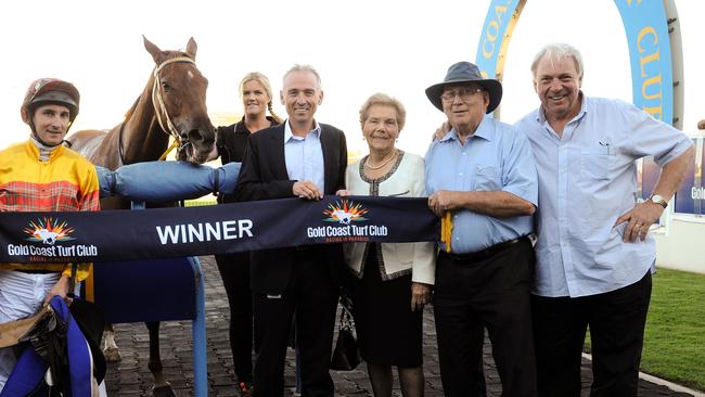 Jockey Luke Rolls, co-trainer Daniel Guy, owners Betty and Jim Forsyth and co-trainer Bryan Guy with Amata after her Gold Coast win. Picture: TRACKSIDE PHOTOGRAPHY/BRUCE THOMAS