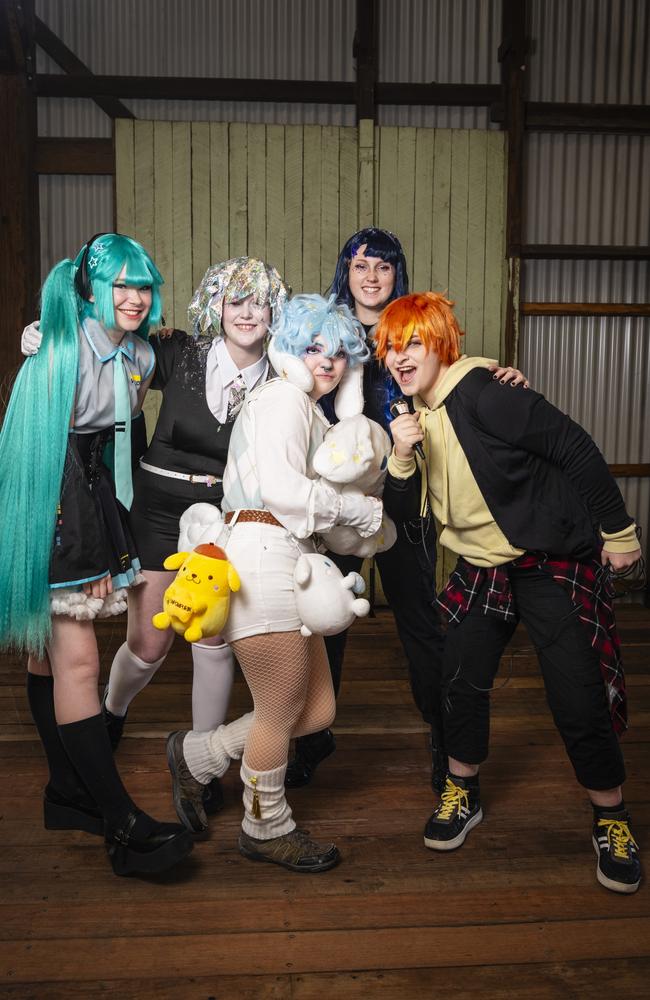 Anime characters (from left) Erin McNaughton as Hatsune Miku, Abbey McCarthy as Diamond, Felix Holley as Cinnamoroll, Reese Drury as Shiraishi An and Xeek Willson as Akito Shinonome at Comic-Geddon at The Goods Shed, Sunday, June 25, 2023. Picture: Kevin Farmer