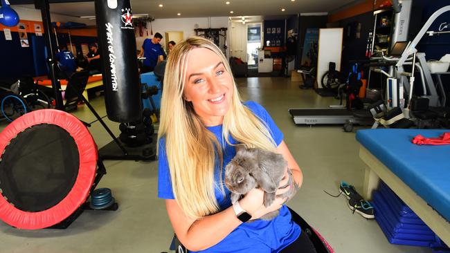 Next Step Spinal Cord Injury Recovery Centre founder Rhiannon Tracey with the centre’s therapy rabbit. Picture: Rob Leeson.