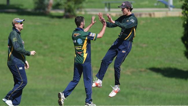 Thunder players celebrate a wicket during last season’s Audrey Baxter Plate 2nd division cricket grand final. Picture: Rob Williams