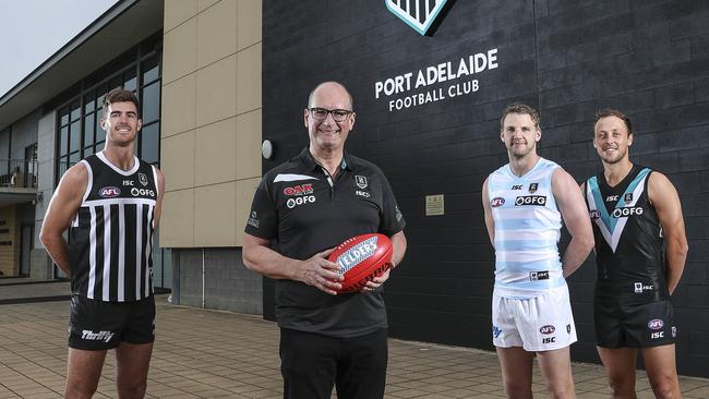 Port Adelaide chairman David Koch with Scott Lycett, Trent McKenzie and Cameron Sutcliffe. Picture: Sarah Reed