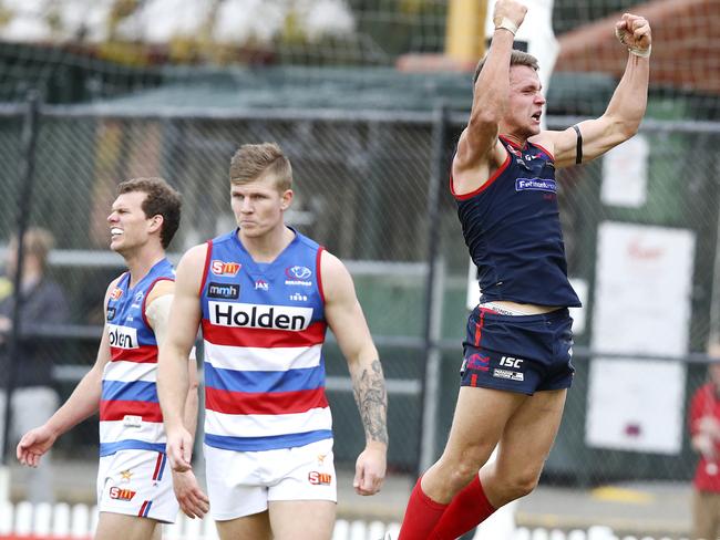 SANFL - Norwood v Central at Coopers Stadium. Peter Bampton tries to gee up the team after his goal. Picture Sarah Reed