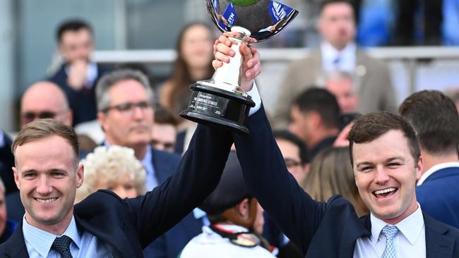 Trainers JD and Ben Hayes celebrate with the trophy. Picture: Vince Caligiuri/Getty Images