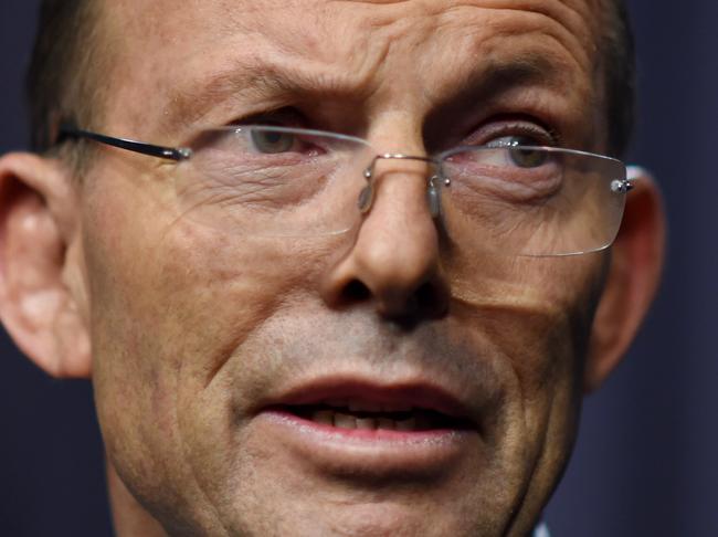 Prime Minister Tony Abbott speaks to the media during a press conference at Parliament House in Canberra, Tuesday, Aug. 11, 2015. A conscience vote for Coalition MPs was debated and rejected in party room meeting. (AAP Image/Lukas Coch) NO ARCHIVING