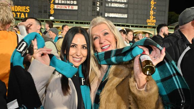 SEPTEMBER 13, 2024: Port fans Veronica Paterson and Leanne Nemes add some culture to the Hill during the Port v Hawthorn semi final at Adelaide Oval. Picture: Brenton Edwards