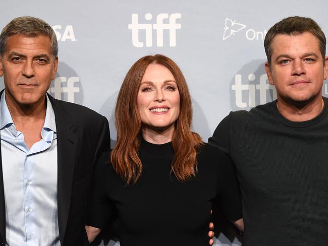 Writer/director/producer George Clooney, actors Julianne Moore and Matt Damon promote Suburbicon at the Toronto International Film Festival. Picture: Kevin Winter/Getty Images/AFP