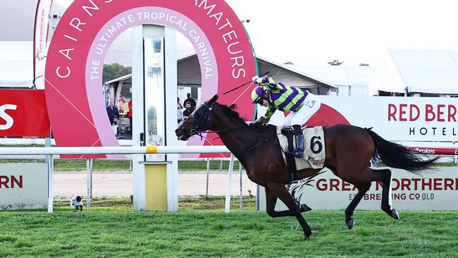 Cashin' Chex, ridden by jockey Lacey Morrison, wins the Cairns Amateurs Cup by two lengths, held at the Cairns Jockey Club, Cannon Park. Picture: Brendan Radke