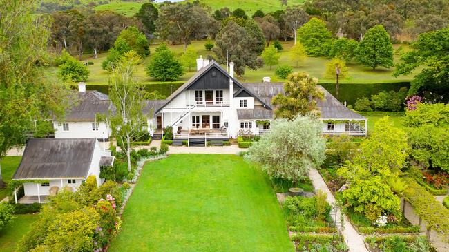 The property features a Colonial-era homestead set over two levels.