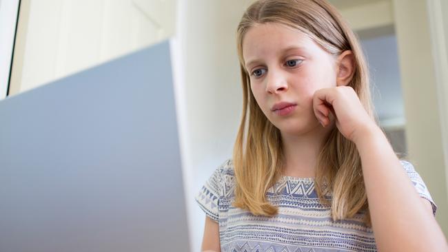 Young Girl Worried About On Line Bullying