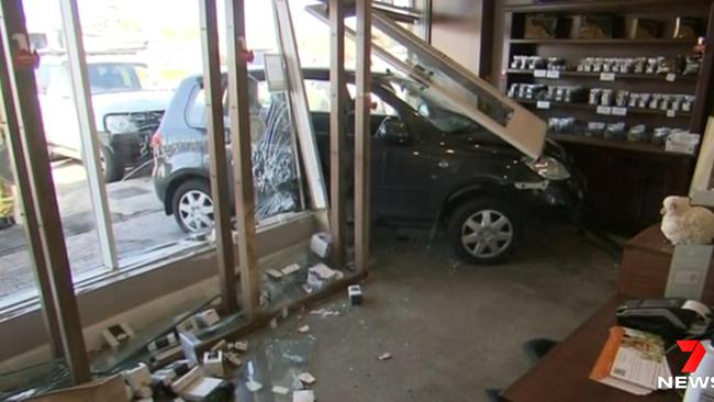 The car caused no injuries but damaged some stock. Picture: 7NEWS