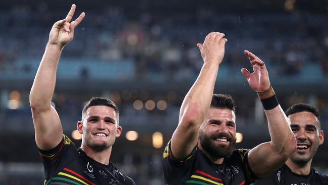 Nathan Cleary, Josh Mansour and Tyrone May of the Panthers thank the crowd after winning the NRL Preliminary Final. Picture: Getty Images