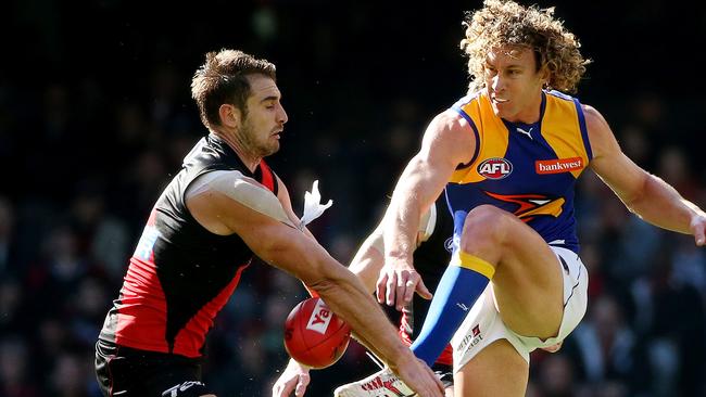 Matt Priddis’ distinctive curly blonde mop at full flight.