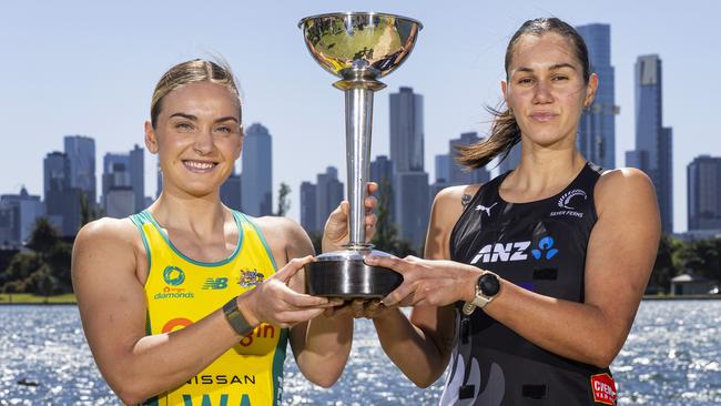 Australian Diamonds captain Liz Watson (L) and New Zealand Silver Ferns captain Ameliaranne Ekenasio with the Constellation Cup, won by Australia on goal difference after the series was split 2-2. Photo: Getty Images