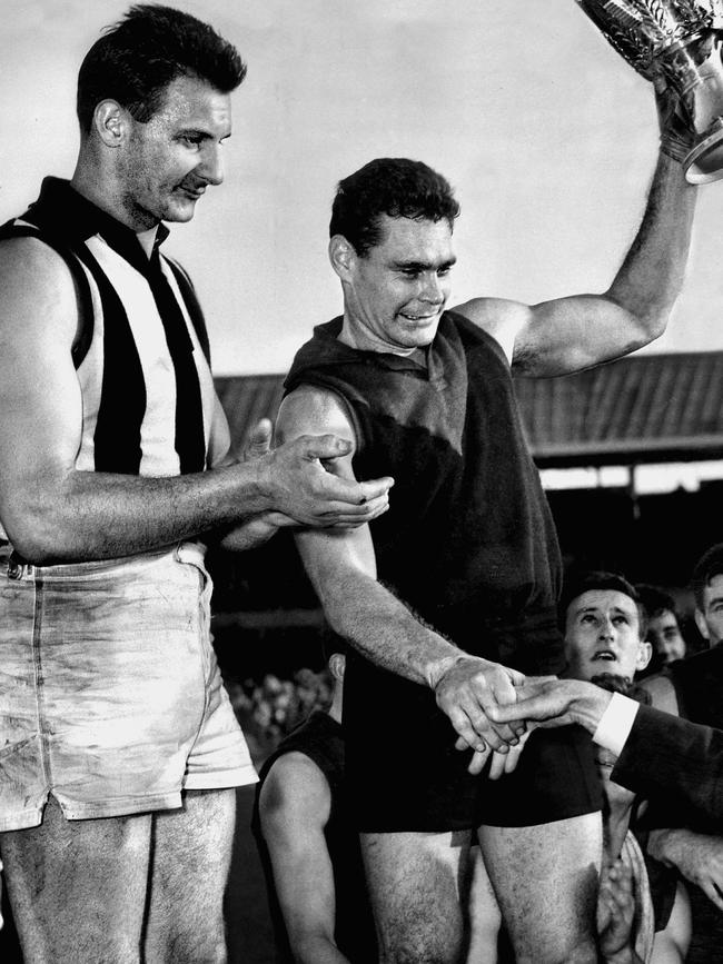 Ron Barassi (right) and Ray Gabelich at the presentation of the 1964 Premiership Cup.